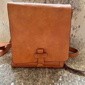 Leather tan backpack.